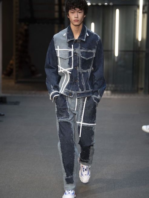 A new era of tech-inspired men's fashion is around the corner, Fashion Snoops says, with tailoring, luxury fabrics and metallic denim.
