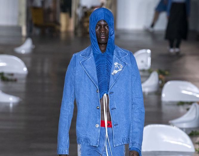 Per Gotesson at London Fashion Week: Men's. Designers at London Fashion Week: Men's enhanced their collections with sustainable materials, durable denim and brazen splashes of color.