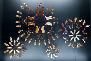 Footwear in nude shades are arranged in pinwheels.