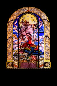 Bespoke stained glass panels depict iconic Louboutin footwear.