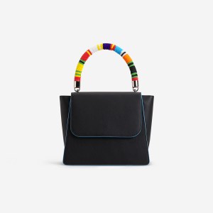 Bag with beaded African handle by Scopinaro.