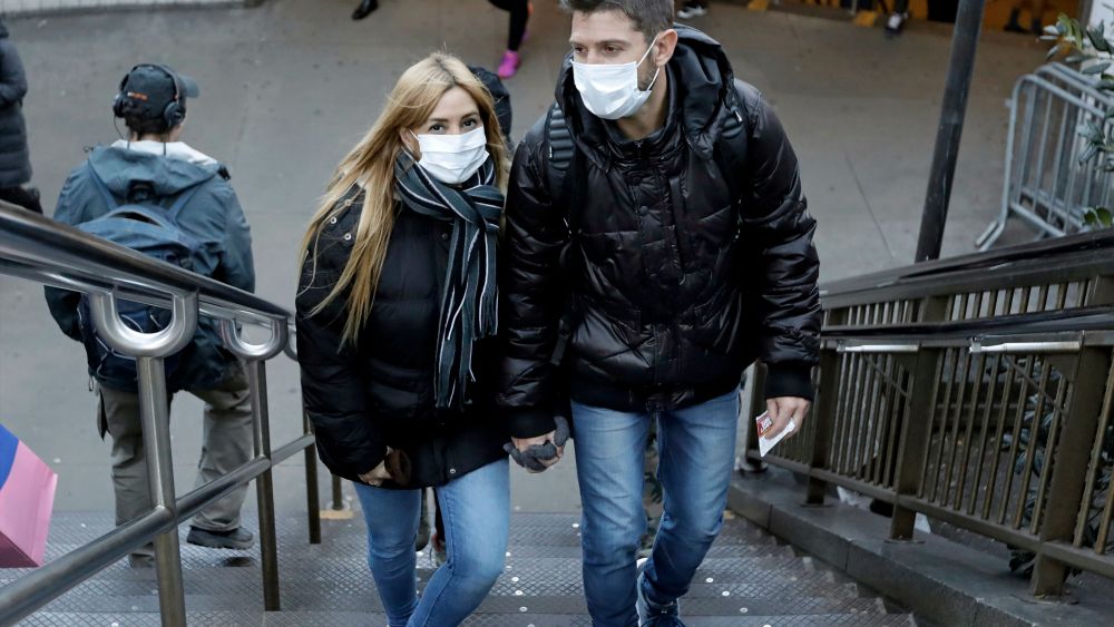 People emerge from the subway wearing protective face masks at Columbus Circle in New York, New York, USA, 04 March 2020. The city recently announced new cases of the coronavirus, including a patient who is a healthcare worker who had recently travelled to Iran.Coronavirus in New York, USA - 04 Mar 2020