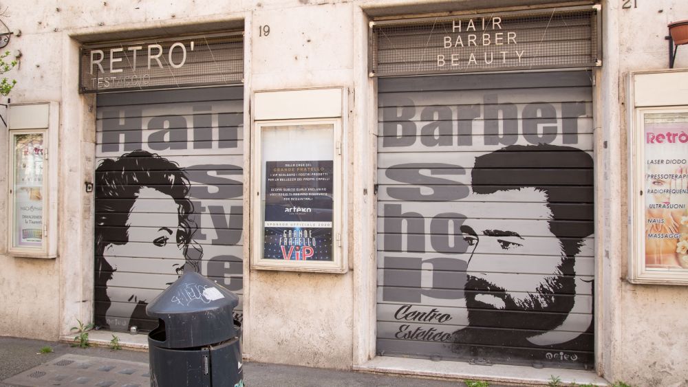 A closed Barber Shop in Testaccio district in RomeRome: Closed shops could reopen in coming weeks, Roma, Italy - 18 Apr 2020