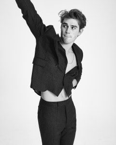 Thom Browne Classic’s single-breasted suit in narrow chalk stripe 120's flannel. Christian Louboutin shoes.