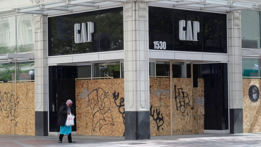 boarded up gap store closed