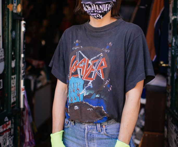 "Gloves are a normal thing, I used to wear them before. I have to carry a lot of heavy stuff and I need to protect my hands. The mask is a new addition. It's mostly for the costumers' comfort. I must say they look funny when worn together." — Julia, who works in Paul's Boutique vintage store in Prezlauer Berg