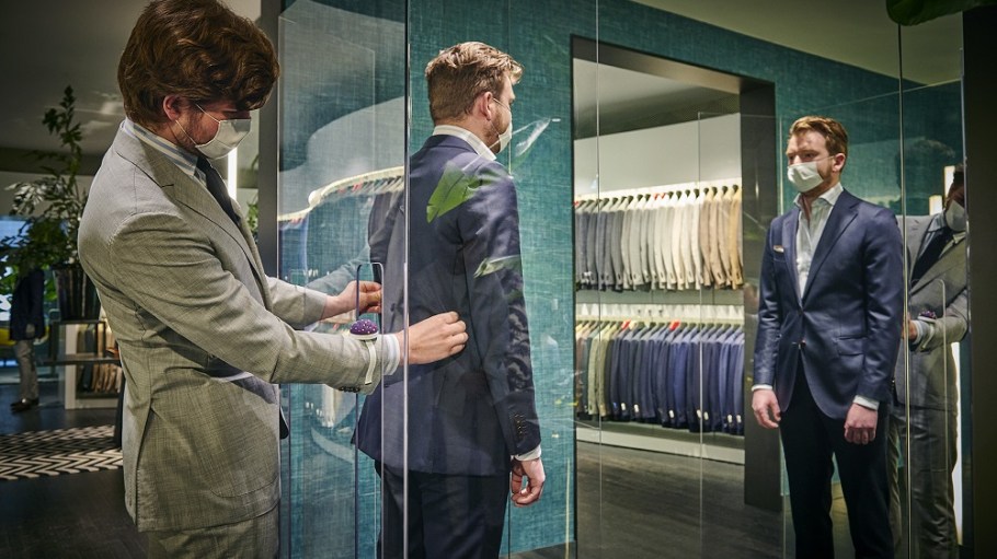 Suitsupply's free-standing Safe Shopping Screens within its fitting rooms.