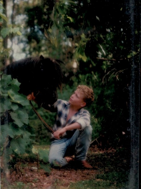 Outland Denim founding CEO and Rivet 50 member James Bartle reflects on his cowboy- and denim-obsessed childhood in a throwback photo.