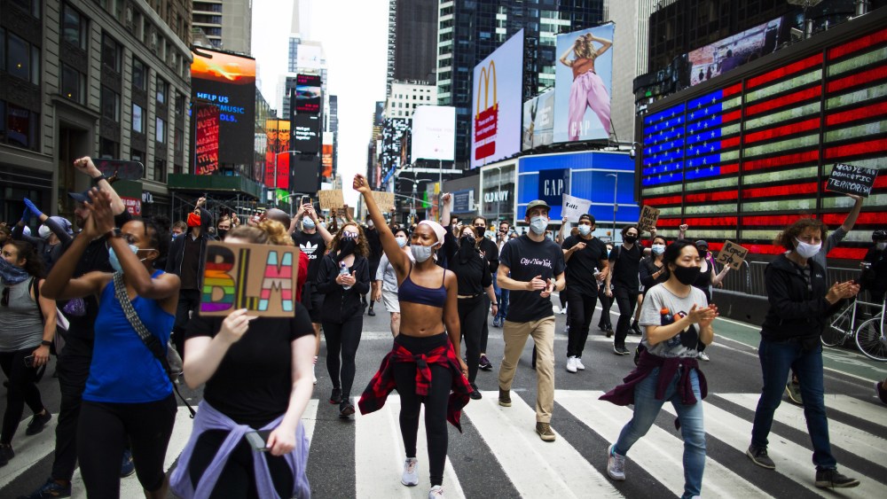 Protesters march in times square