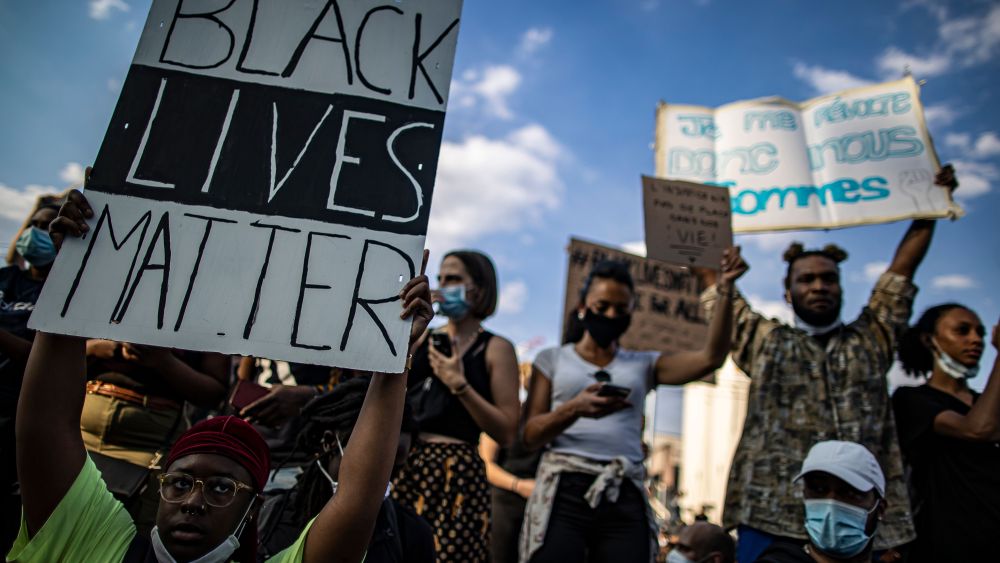 Protesters take part in a demonstration to protest in support of the George Floyd protests in the United States, and also to commemorate a similar circumstance in France when Adama Traore, a 24 year old old black Frenchman who was killed in 2016 by police, during an illegal rally in front of the new courthouse in Paris, France, 02 June 2020.Protest in Paris against US police brutality, France - 02 Jun 2020