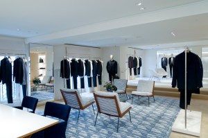 Formal men's wear is displayed on the top floor.