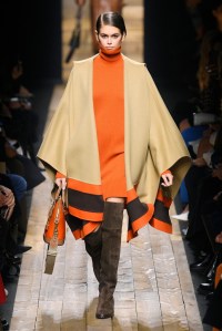 For fall 2020, Kors sought to deliver a protective feeling, even though he had no idea of the COVID-19 crisis to come. He told clients they should feel as if ÒyouÕre wrapped up in the chicest security blanket in the world.Ó On the runway, Kaia Gerber wore a variation on a poncho designed 24 years ago. Though KaiaÕs mother, Cindy Crawford, walked that show, Naomi Campbell wore the original poncho.