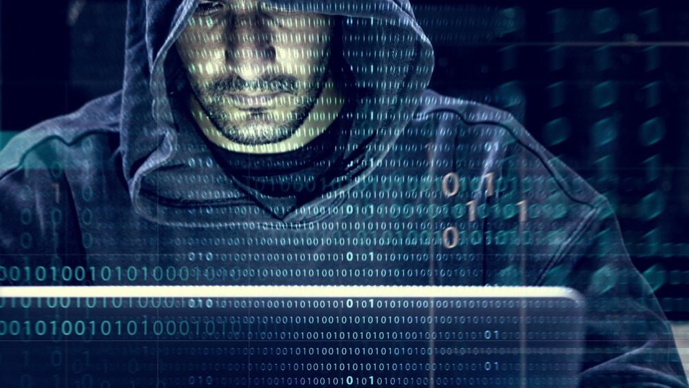 Hacker working on computer cyber crime