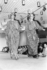 Runway show of Yves Saint Laurent's Fall 1976 collection. Article title: "Paris' Big Fantasy"