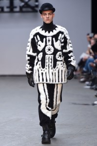 A model on the runway at KTZ fall 2015 menswear show.