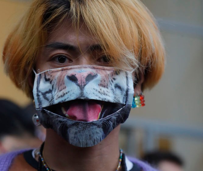 From New York to Paris, fashion week goers take necessary coronavirus health precautions by stepping out in stylish face masks.