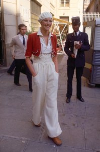 Cropped red jacket with high-waist cream pants and hat from Kenzo's Spring 1974 RTW collection.