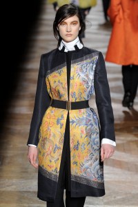 A model on the runway at Dries Van Noten's fall 2012 Ready to Wear show featuring Asian iconography