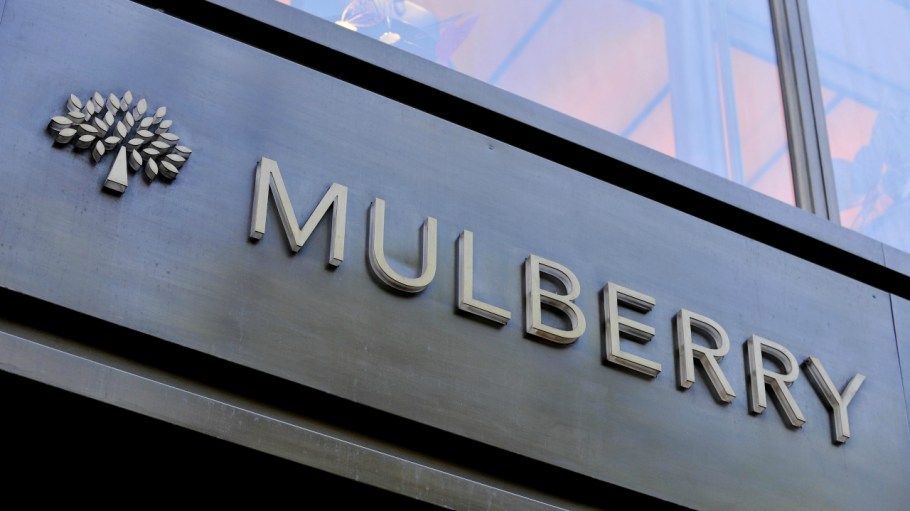 Mike Ashley's Frasers Group raises its stake in Mulberry to 37%, and reserves its takeover option for the British luxury firm.