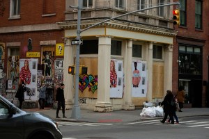 Boarded up stores across SoHo in New York .