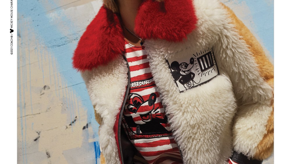 Kaia Gerber in Coach's Mickey Mouse x Keith Haring collection.