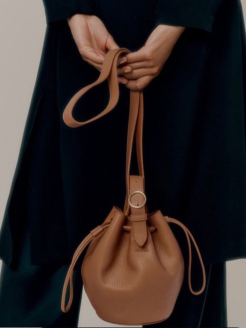 Cuyana's smaller leather goods, like its mini drawstring bucket bag, performed better than its work-ready totes throughout the pandemic.