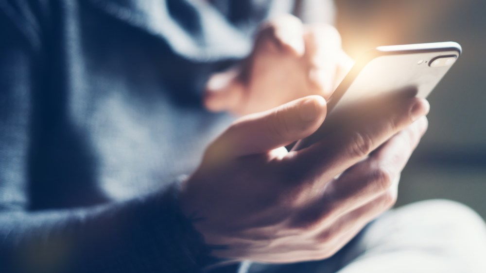 Young man with smartphone