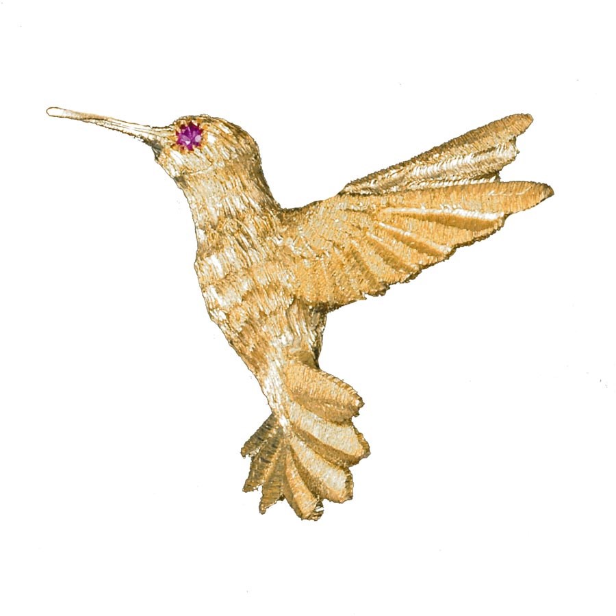 Inauguration Fashion 2021: Scully and Scully 18k yellow gold bird brooch with ruby eye, $1,400