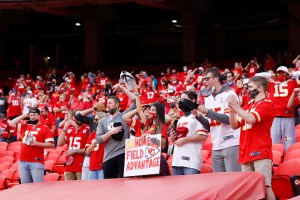 A group of Kansas City Chiefs fans seen cheering.