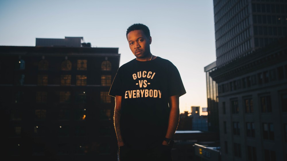 man wearing gucci detroit shirt