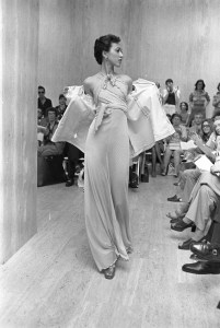 Model Pat Cleveland poses in a lettuce-edge dress and jacket from Stephen Burrows Fall 1973 Ready to Wear collection.