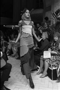 Pat Cleveland poses in a lettuce edge color block dress from Stephen Burrows Fall 1971 ready to wear collection at Henri Bendel's in New York City.