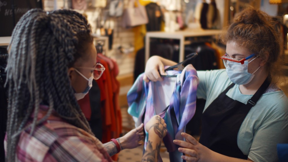 clothing store workers with mask