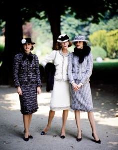 Models pose in looks from Chanel's fall 1983 couture collection advance. Designer Karl Lagerfeld's second couture collection for the House of Chanel.