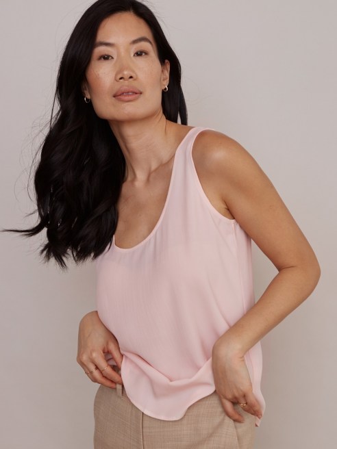 Elevated women's basics brand Numi launched a Sustainable Silk line, including a button-up, short-sleeve blouse, tank top and classic cami.