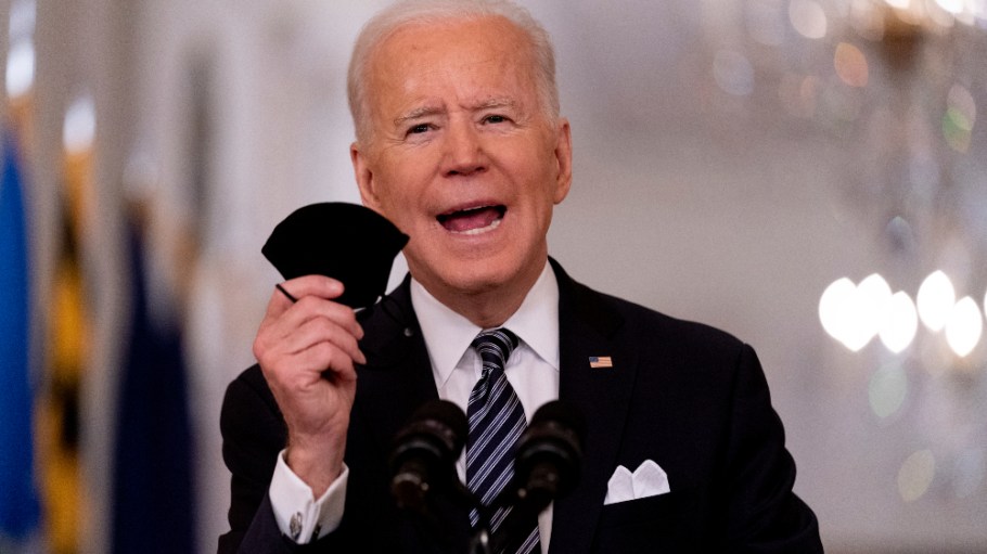 President Biden signed a $1.9 trillion coronavirus relief bill into law Thursday and set July 4 as a target date for a return to normalcy.