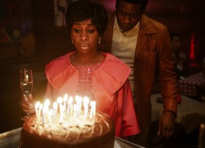 Ted White (R), played by Malcolm Barrett, with Aretha Franklin (L), played by Cynthia Erivo, as she makes a wish and blows out birthday candles after performing in a small club in New York City. (Credit: National Geographic/Richard DuCree)