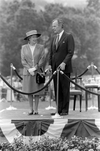 Queen Elizabeth II of England and George H.W. Bush attend a ceremony welcoming the queen to the White House in Washington, D.C., on May 14, 1991.