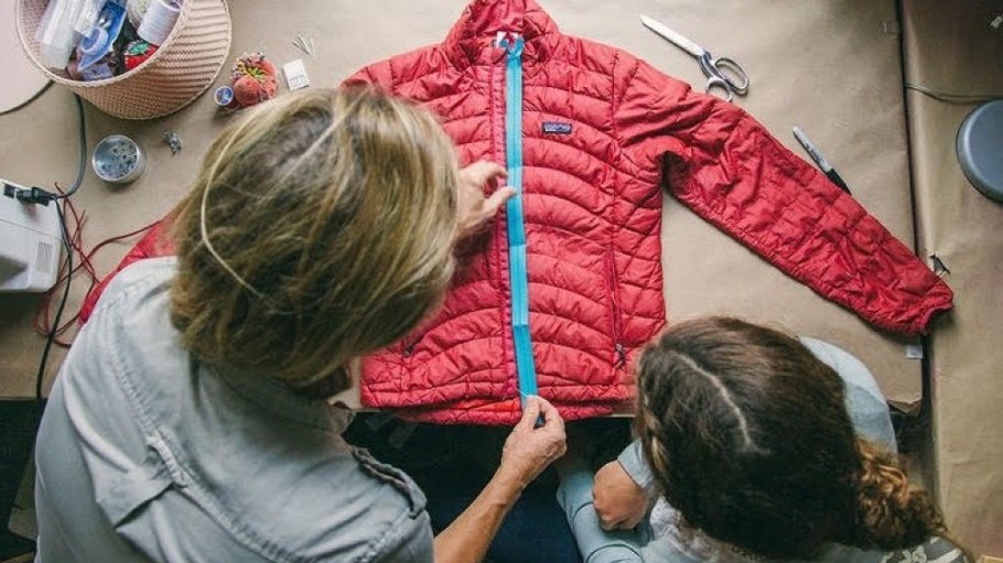 Patagonia earned the No. 1 spot on Kearney's Circular Fashion Index. Here, designers repair a jacket as a part of the company's Worn Wear program.