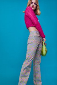Nana Jacqueline’s mohair tank and cardigan and Maisie Wilen’s polyester, cotton and elastane trousers. Staud bag.