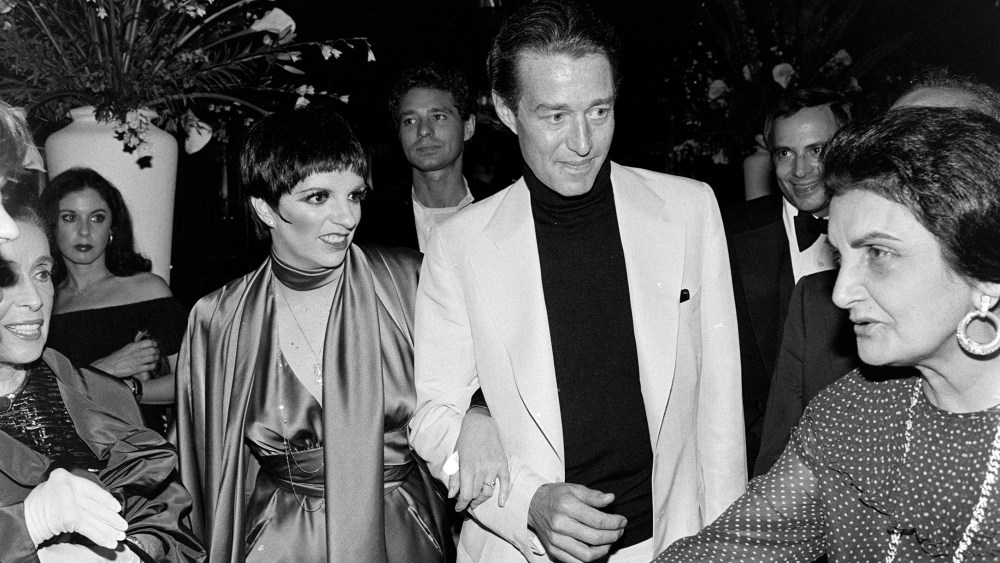 Liza Minnelli (3rd from L) and Halston (C) attend a party, benefitting the Martha Graham Center for Contemporary Dance, at Studio 54 in New York City on June 22, 1978.