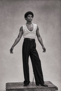 Ardusse’s wool vest and Ann Demeulemeester’s virgin wool pants and belt. Givenchy necklace; Agmes earring; Comme des Garçons Homme Plus shoes.