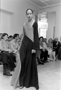 Model Pat Cleveland poses in a color-blocked satin gown from Halston's Fall 1976 Made-to-Order Collection.