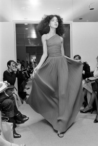 Model Pat Cleveland photographed by Bill Cunningham while walking in  Halston's Spring 1978 Ready to Wear fashion show.