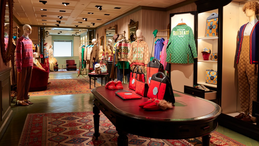 Gucci teases 100th anniversary collection at Milan flagship during fashion week.