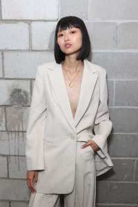 SYDNEY, AUSTRALIA - JUNE 02: A model prepares backstage ahead of the Anna Quan show during Afterpay Australian Fashion Week 2021 Resort '22 Collections at Franca Brasserie on June 02, 2021 in Sydney, Australia. (Photo by Brendon Thorne/Getty Images)
