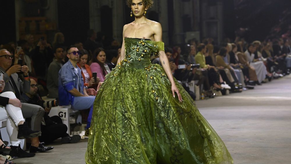 SYDNEY, AUSTRALIA - JUNE 02: A model walks the runway during the First Nations Fashion + Design show during Afterpay Australian Fashion Week 2021 Resort '22 Collections at Carriageworks on June 02, 2021 in Sydney, Australia. (Photo by Stefan Gosatti/Getty Images)