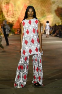 SYDNEY, AUSTRALIA - JUNE 02: A model walks the runway in a design by Sown In Time during the First Nations Fashion + Design show during Afterpay Australian Fashion Week 2021 Resort '22 Collections at Carriageworks on June 02, 2021 in Sydney, Australia. (Photo by Stefan Gosatti/Getty Images)