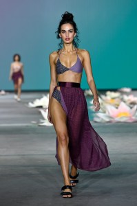 SYDNEY, AUSTRALIA - JUNE 03: A model walks the runway in a design by Liandra Swim during the Indigenous Fashion Projects show during Afterpay Australian Fashion Week 2021 Resort '22 Collections at Carriageworks on June 03, 2021 in Sydney, Australia. (Photo by Stefan Gosatti/Getty Images)