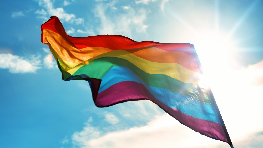 pride flag on sky background